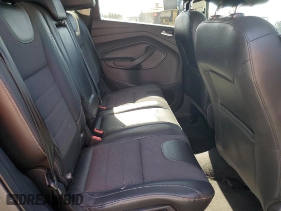 2016 Ford Escape SE z VIN 1FMCU9G96GUB76771, wystawiony jako Copart lot #59188375 z przebiegiem 167 300 mil mil oraz Szkoda całkowita • Salvage title. Historia ofert i sprzedaży dostępna na DreamBid. Obrazek 11.