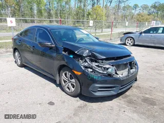 2017 Honda Civic Sedan LX with VIN 19XFC2F57HE061090, listed as a IAAI auction lot 41887402 with 129,167 mi miles. Bid and sale history available at carsss.com. Image 1.