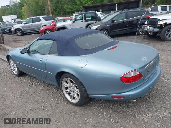 2002 Jaguar XK with VIN SAJDA42CX2NA28816, listed as a IAAI auction lot 42029672 with 130,978 mi miles and . Bid and sale history available at DreamBid. Image 3.