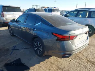 2021 Nissan Altima 2.5 SV with VIN 1N4BL4DV0MN312671, listed as a IAAI auction lot 41518231 with 64,816 mi miles. Bid and sale history available at carsss.com. Image 3.