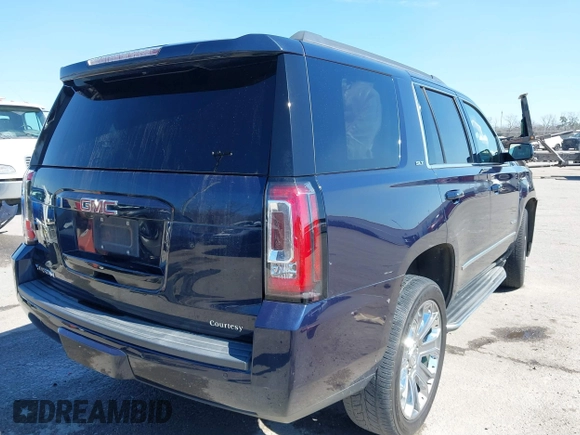 2017 GMC Yukon SLT with VIN 1GKS1BKC9HR356600, listed as a IAAI auction lot 41694218 with 155,855 mi miles. Bid and sale history available at carsss.com. Image 4.