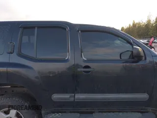 2005 Nissan Xterra SE z VIN 5N1AN08WX5C652933, wystawiony jako IAAI lot #41504547 z przebiegiem 199 570 mil mil oraz . Historia ofert i sprzedaży dostępna na DreamBid. Obrazek 14.