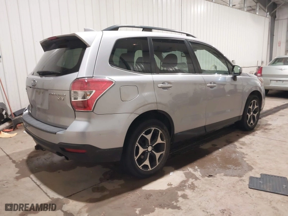 2016 Subaru Forester 2.0XT Premium with VIN JF2SJGDC4GH551225, listed as a IAAI auction lot 40831025 with 70,996 mi miles. Bid and sale history available at carsss.com. Image 4.
