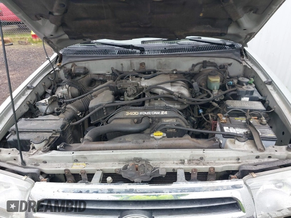 1999 Toyota 4Runner SR5 with VIN JT3HN86RXX0232435, listed as a IAAI auction lot 41473618 with 267,054 mi miles and . Bid and sale history available at DreamBid. Image 10.