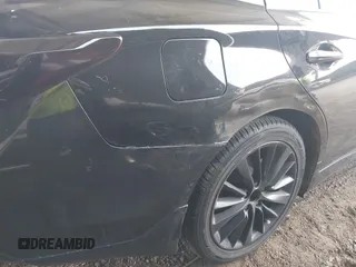 2019 Infiniti Q50 Luxe with VIN JN1EV7ARXKM593846, listed as a IAAI auction lot 42773548 with 57,165 mi miles and . Bid and sale history available at DreamBid. Image 6.