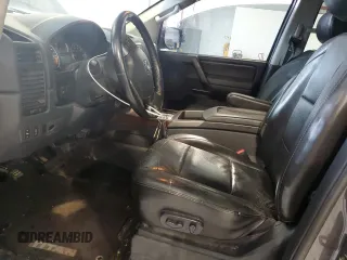 2012 Nissan Titan SL with VIN 1N6BA0ECXCN300562, listed as a Copart auction lot 58244125 with 131,595 mi miles and Salvage title. Bid and sale history available at DreamBid. Image 7.