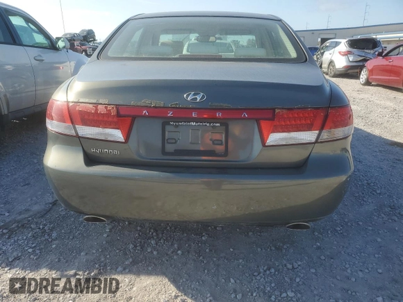 2007 Hyundai Azera SE z VIN KMHFC46FX7A178714, wystawiony jako Copart lot #49264985 z przebiegiem 89 266 mil mil oraz Szkody całkowita. Historia ofert i sprzedaży dostępna na DreamBid. Obrazek 6.