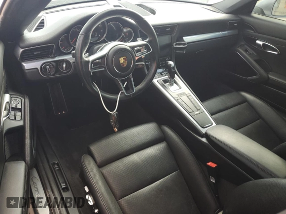 2018 Porsche 911 Carrera z VIN WP0AA2A93JS105437, wystawiony jako Copart lot #78437934 z przebiegiem Nie podano mil oraz Szkoda całkowita • Salvage title. Historia ofert i sprzedaży dostępna na DreamBid. Obrazek 8.