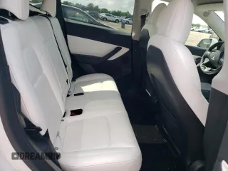 2022 Tesla Model Y Performance z VIN 7SAYGDEF4NF389191, wystawiony jako Copart lot #61443135 z przebiegiem 70 612 mil mil oraz Szkoda całkowita • Salvage title. Historia ofert i sprzedaży dostępna na DreamBid. Obrazek 10.