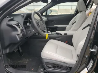 2025 Lexus UX with VIN JTHUCJDH5S2003058, listed as a Copart auction lot 43457505 with 1,239 mi miles and Salvage Title. Bid and sale history available at carsss.com. Image 7.