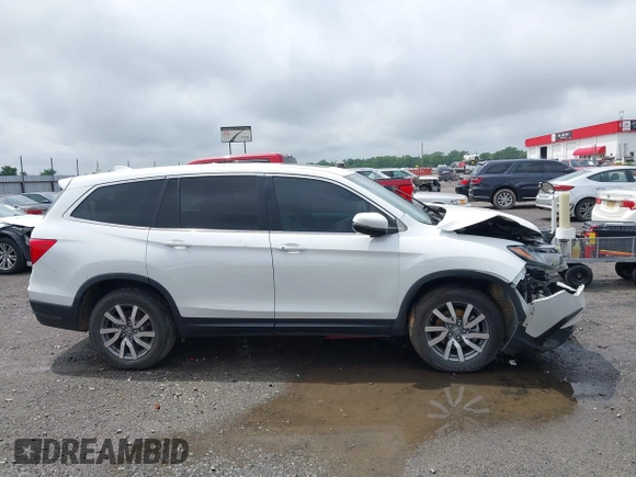 2020 Honda Pilot EX-L z VIN 5FNYF6H57LB067852, wystawiony jako IAAI lot #42172590 z przebiegiem 109 026 mil mil oraz . Historia ofert i sprzedaży dostępna na DreamBid. Obrazek 14.