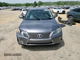 2015 Lexus RX 450h z VIN 2T2ZB1BA3FC001148, wystawiony jako Copart lot #56980375 z przebiegiem 162 749 mil mil oraz Szkoda całkowita • Salvage title. Historia ofert i sprzedaży dostępna na DreamBid. Obrazek 15.