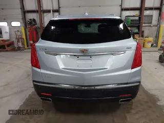 2017 Cadillac XT5 Premium Luxury AWD z VIN 1GYKNERS4HZ306955, wystawiony jako IAAI lot #41932934 z przebiegiem 150 050 mil mil oraz . Historia ofert i sprzedaży dostępna na DreamBid. Obrazek 16.