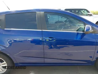 2014 Chevrolet Sonic LT with VIN 1G1JC6SB0E4205646, listed as a IAAI auction lot 41925745 with 84,102 mi miles. Bid and sale history available at carsss.com. Image 13.