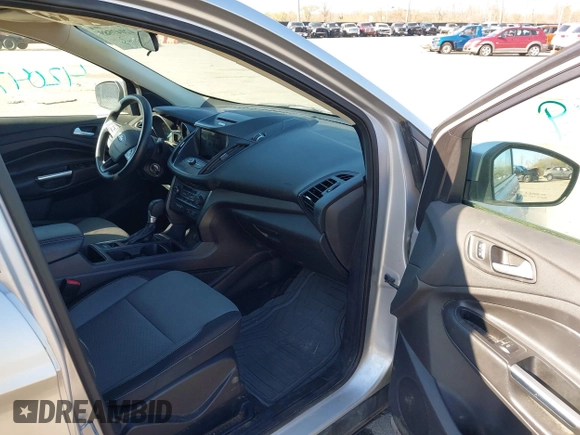 2017 Ford Escape SE with VIN 1FMCU0GDXHUB27848, listed as a IAAI auction lot 42047589 with 128,823 mi miles. Bid and sale history available at carsss.com. Image 5.