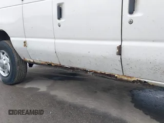 2005 Ford Econoline Cargo with VIN 1FTNE24W95HB25640, listed as a IAAI auction lot 41335337 with 183,045 mi miles. Bid and sale history available at carsss.com. Image 14.