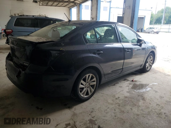 2016 Subaru Impreza Premium с VIN JF1GJAB69GH003936, выставлен на аукционе Copart как лот 63575175 с пробегом 88 996 миль миль и Списание • Salvage title. История ставок и продаж доступна на DreamBid. Изображение 3.