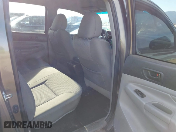 2014 Toyota Tacoma with VIN 3TMLU4EN3EM143882, listed as a IAAI auction lot 40657975 with 125,008 mi miles. Bid and sale history available at carsss.com. Image 8.