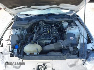 2021 Ford Mustang EcoBoost with VIN 1FA6P8TH8M5146814, listed as a IAAI auction lot 42320578 with 94,237 mi miles and . Bid and sale history available at DreamBid. Image 10.