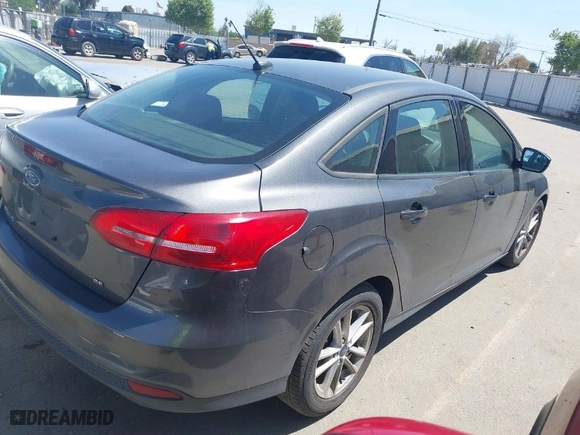 2017 Ford Focus SE with VIN 1FADP3F26HL308880, listed as a IAAI auction lot 41991909 with 103,403 mi miles. Bid and sale history available at carsss.com. Image 4.