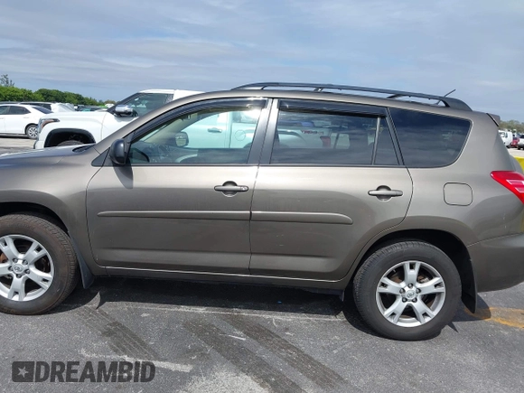 2012 Toyota RAV4 with VIN 2T3BF4DV4CW237305, listed as a IAAI auction lot 41590091 with 114,757 mi miles and . Bid and sale history available at carsss.com. Image 14.