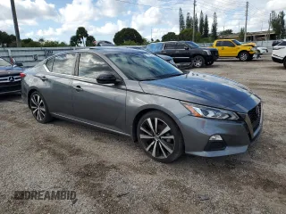2022 Nissan Altima 2.0 SR with VIN 1N4AL4CV3NN310654, listed as a Copart auction lot 77949304 with 69,558 mi miles and Salvage Title. Bid and sale history available at carsss.com. Image 4.