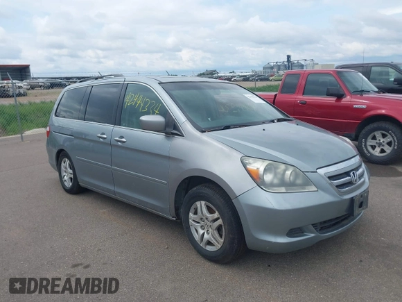 2007 Honda Odyssey EX-L z VIN 5FNRL38717B124209, wystawiony jako IAAI lot #42444334 z przebiegiem 230 123 mil mil oraz . Historia ofert i sprzedaży dostępna na DreamBid. Obrazek 1.