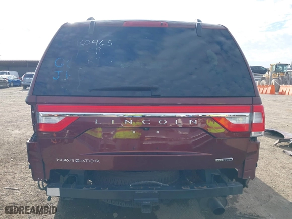 2015 Lincoln Navigator with VIN 5LMJJ2JT4FEJ12021, listed as a IAAI auction lot 41880471 with 104,979 mi miles. Bid and sale history available at carsss.com. Image 18.