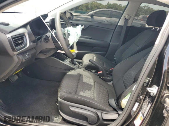 2023 Kia Rio LX with VIN 3KPA24AD3PE577081, listed as a Copart auction lot 54427095 with 18,292 mi miles and Non Repairable. Bid and sale history available at DreamBid. Image 7.
