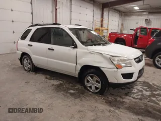 2010 Kia Sportage LX with VIN KNDKGCA35A7718764, listed as a IAAI auction lot 41512368 with 122,420 mi miles and . Bid and sale history available at carsss.com. Image 1.