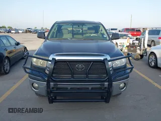2007 Toyota Tundra SR5 with VIN 5TFRT54117X006566, listed as a IAAI auction lot 42074633 with 277,024 mi miles and . Bid and sale history available at DreamBid. Image 12.