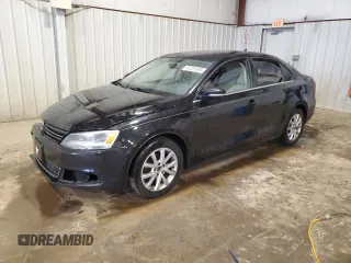 2014 Volkswagen Jetta SE with VIN 3VWD17AJ6EM387167, listed as a Copart auction lot 52251955 with 150,441 mi miles and Salvage title. Bid and sale history available at DreamBid. Image 1.