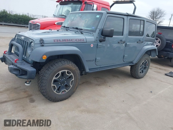 2015 Jeep Wrangler Unlimited Rubicon Hard Rock z VIN 1C4HJWFG1FL679873, wystawiony jako IAAI lot #41508722 z przebiegiem 97 165 mil mil oraz . Historia ofert i sprzedaży dostępna na DreamBid. Obrazek 17.
