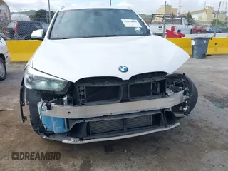 2018 BMW X1 sDrive28i with VIN WBXHU7C38J5L05985, listed as a IAAI auction lot 42014649 with 77,082 mi miles. Bid and sale history available at carsss.com. Image 18.