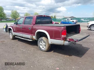 2002 Dodge Dakota z VIN 1B7HG48X92S626936, wystawiony jako IAAI lot #42192429 z przebiegiem 170 746 mil mil oraz . Historia ofert i sprzedaży dostępna na DreamBid. Obrazek 3.