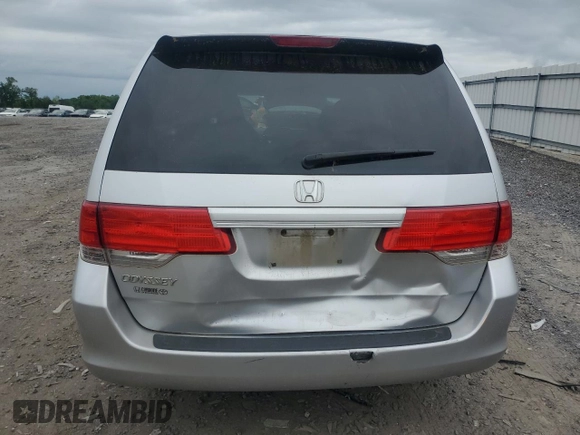 2010 Honda Odyssey LX z VIN 5FNRL3H29AB016853, wystawiony jako Copart lot #56602085 z przebiegiem 154 518 mil mil oraz Szkoda całkowita • Salvage title. Historia ofert i sprzedaży dostępna na DreamBid. Obrazek 6.