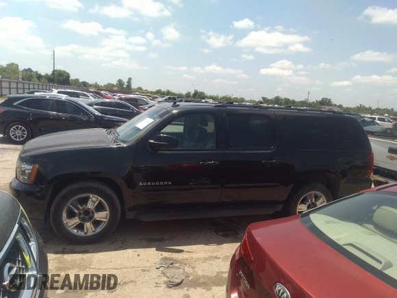 2013 Chevrolet Suburban LT with VIN 1GNSCJE05DR142688, listed as a IAAI auction lot 42214548 with 236,464 mi miles and . Bid and sale history available at DreamBid. Image 14.