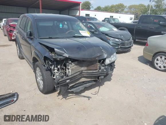 2015 Dodge Journey American Value Pkg with VIN 3C4PDCAB2FT641361, listed as a IAAI auction lot 40299991 with 202,003 mi miles. Bid and sale history available at carsss.com. Image 6.