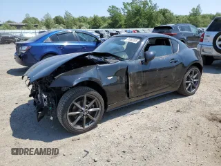 2018 Mazda MX-5 Miata Grand Touring with VIN JM1NDAM76J0201975, listed as a Copart auction lot 61893385 with 58,557 mi miles and Salvage title. Bid and sale history available at DreamBid. Image 1.