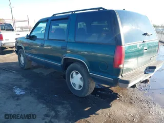 1996 Chevrolet Tahoe with VIN 1GNEK13R9TJ392739, listed as a IAAI auction lot 41559513 with 257,457 mi miles. Bid and sale history available at carsss.com. Image 3.