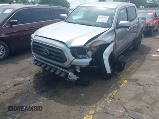 2023 Toyota Tacoma SR with VIN 3TYCZ5AN2PT176554, listed as a IAAI auction lot 42148651 with 15,255 mi miles and . Bid and sale history available at DreamBid. Image 6.