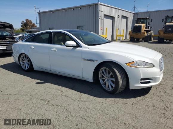 2013 Jaguar XJ with VIN SAJWA1C79D8V51400, listed as a Copart auction lot 54972475 with 79,471 mi miles and Clean Title. Bid and sale history available at DreamBid. Image 4.