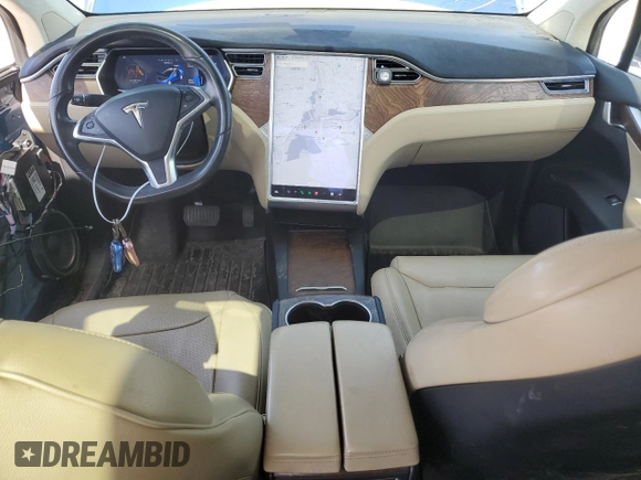 2017 Tesla Model X 90D with VIN 5YJXCDE23HF044790, listed as a Copart auction lot 52376565 with 105,712 mi miles and Salvage Title. Bid and sale history available at DreamBid. Image 8.
