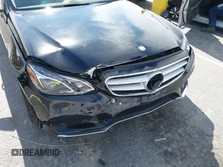 2014 Mercedes-Benz E 350 Sport with VIN WDDHF5KBXEA889555, listed as a IAAI auction lot 41589052 with 148,422 mi miles and . Bid and sale history available at DreamBid. Image 6.