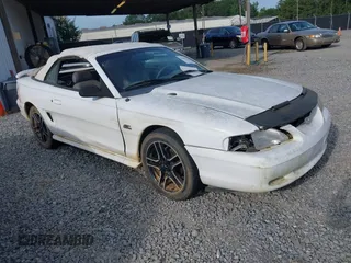 1994 Ford Mustang with VIN 1FALP45T2RF189589, listed as a IAAI auction lot 42497220 with 98,565 mi miles and . Bid and sale history available at DreamBid. Image 1.