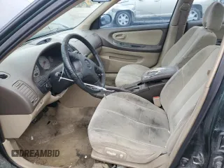 2000 Nissan Maxima GXE z VIN JN1CA31D7YT522165, wystawiony jako Copart lot #47566965 z przebiegiem 336 529 mil mil oraz Czysty tytuł • Clean title. Historia ofert i sprzedaży dostępna na DreamBid. Obrazek 7.