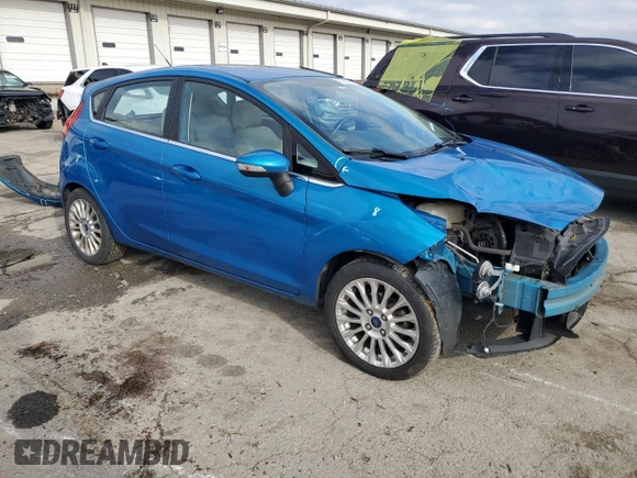 2015 Ford Fiesta Titanium z VIN 3FADP4FJ7FM120958, wystawiony jako Copart lot #85260204 z przebiegiem 144 587 mil mil oraz Szkoda całkowita • Salvage title. Historia ofert i sprzedaży dostępna na DreamBid. Obrazek 4.