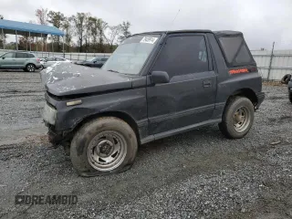 1992 Geo Tracker z VIN 2CNBJ18U8N6938728, wystawiony jako Copart lot #79459914 z przebiegiem 17 751 mil mil oraz Szkody całkowita. Historia ofert i sprzedaży dostępna na DreamBid. Obrazek 1.