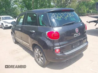 2014 FIAT 500L Lounge with VIN ZFBCFACH1EZ003031, listed as a IAAI auction lot 42232861 with 104,496 mi miles and . Bid and sale history available at DreamBid. Image 3.