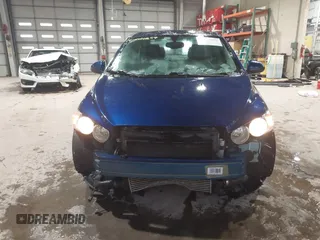 2014 Chevrolet Sonic LTZ with VIN 1G1JE5SB5E4226187, listed as a IAAI auction lot 41521689 with 73,325 mi miles. Bid and sale history available at carsss.com. Image 6.